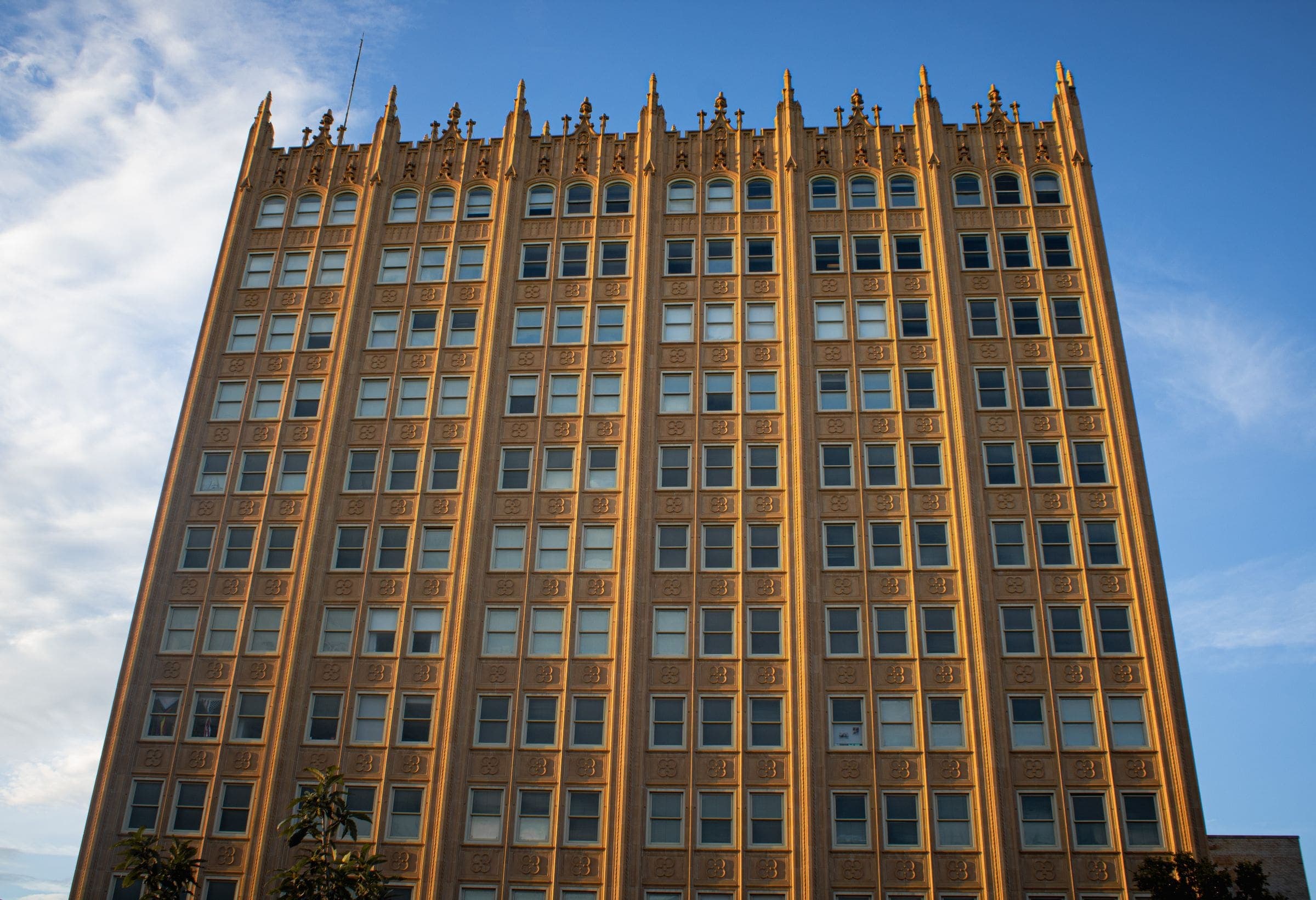 The historic Petroleum Building in downtown Midland, TX, under a blue sky